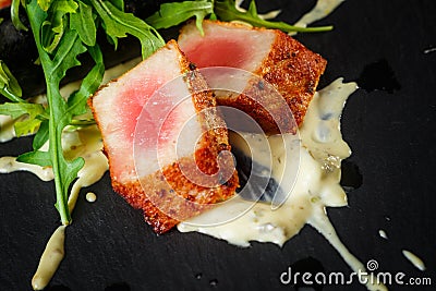 Grilled tuna with long roll and salad Stock Photo