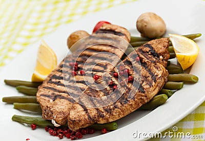 Grilled turkey fillet and green beans Stock Photo