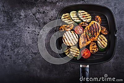 Grilled Zucchini Tomato with chili pepper. Italian mediterranean or greek cuisine. Vegan vegetarian food Stock Photo