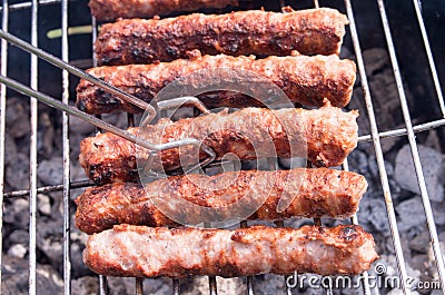 Grilling. Cooking barbecue with charcoal in the garden. T Stock Photo