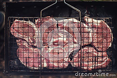 Grilling fresh entrecote pork Stock Photo