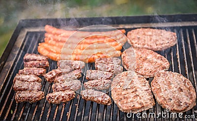 Grilling Meat on barbecue grill with coal. Stock Photo
