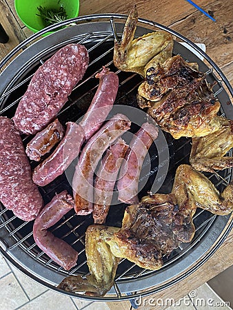 grilled meat on barbecue or fireplace Stock Photo