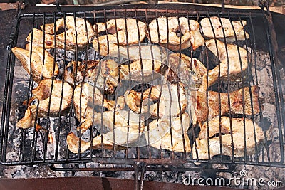 Grilling salmon fish pieces Stock Photo