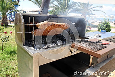 Grilling traditional Turkish kokorec stock photo Stock Photo