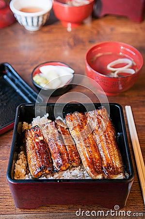 Grilling Unagi eel for Japanese Unagi donburi rice recipe Stock Photo