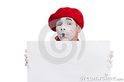 grimacing mime holding empty board Stock Photo