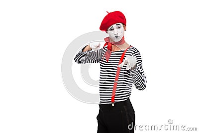 grimacing mime pointing on camera Stock Photo