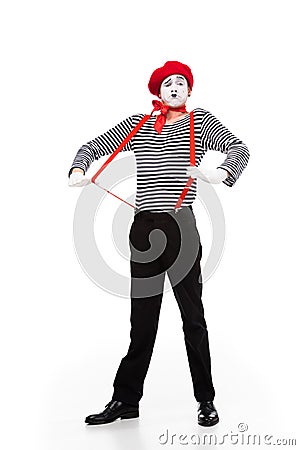 grimacing mime with red suspenders Stock Photo