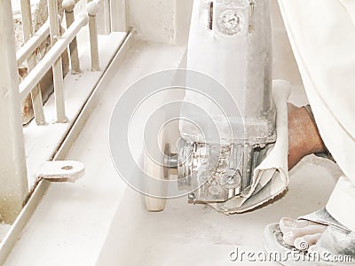 Grinding The Tiled Floor Stock Photo