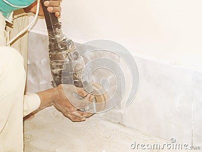 Grinding The Tiled Floor Stock Photo