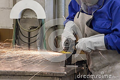 Grinding work in industrial factory Stock Photo