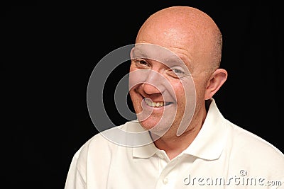 Grinning bald man Stock Photo