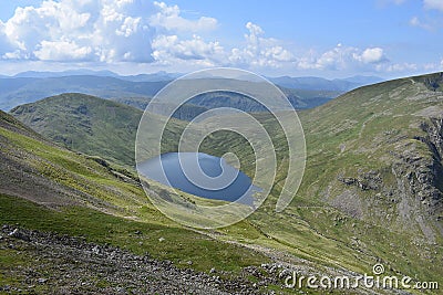Grisedale Tarn with Seat Sandal left, Lake District Stock Photo
