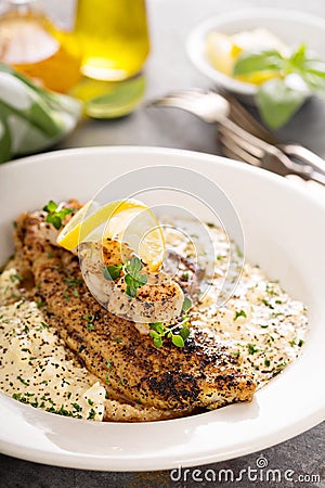 Grits with fried fish and shrimp Stock Photo