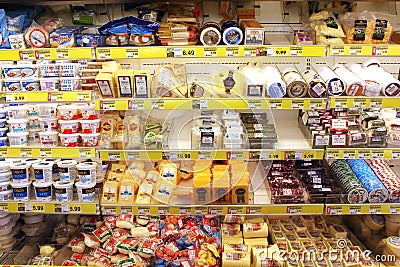 Grocery store cheese shelves Editorial Stock Photo