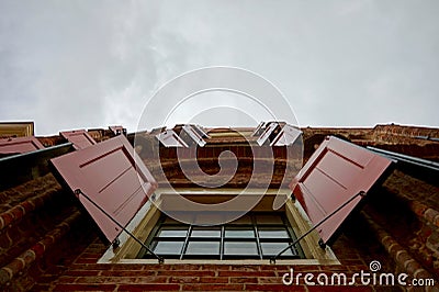 Restored European medieval building window shutters hatches, Editorial Stock Photo