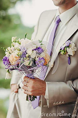 Groom with flowers Stock Photo