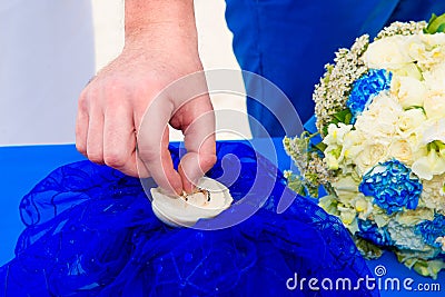 Groom giving an engagement ring to his bride. Wedding ceremony o Stock Photo