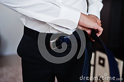 Groom wear belt. Wedding details. Man`s style Stock Photo