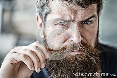 Grooming and barber shop concept. Masculinity and brutality. Male beauty. Macho brutal bearded hipster flirting close up Stock Photo