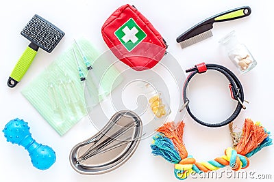 Grooming set with pets cure tools on white background top view Stock Photo