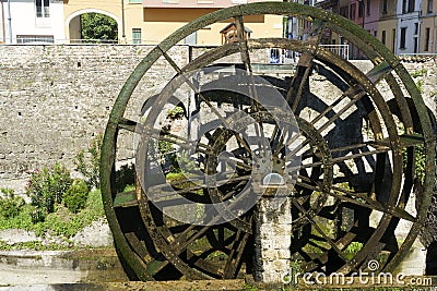 Groppello Italy: big wooden wheel on Martesana canal Stock Photo