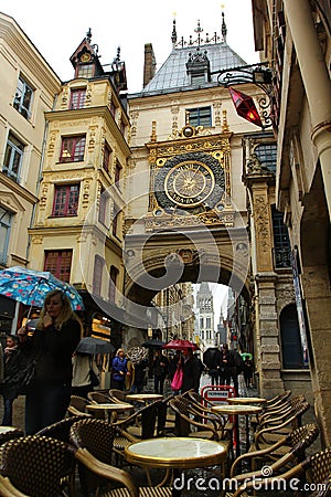 The Gros-Horloge English: Great-Clock is a fourteenth-century Renaissance astronomical clock in Rouen, Normandy on an autumn rai Editorial Stock Photo