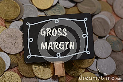 Gross margin is a financial metric a company's profitability by assessing the profitability of core business activities. Stock Photo