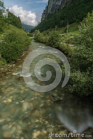 Grossarler Ache river in sunny cloudy morning in Austria Stock Photo