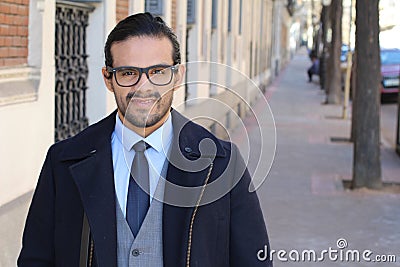 Grossed out looking businessman outdoors Stock Photo