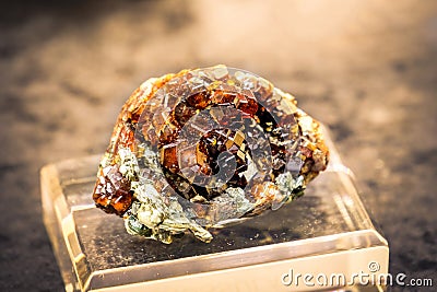 Grossular hessonite mineral orange quartz gemstone vignette Stock Photo