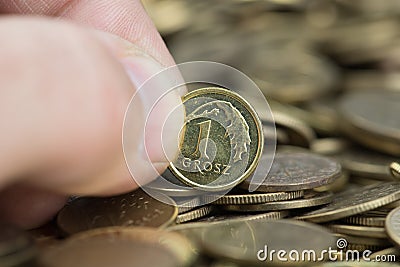 Grosz in fingers Stock Photo