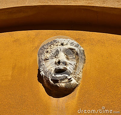 Grotesque face in Venice Stock Photo
