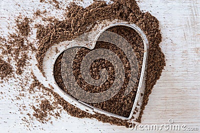 Ground Allspice in a Heart Shape Stock Photo