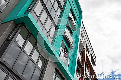 Ground angular view of dwelling house against cloudy sky Stock Photo