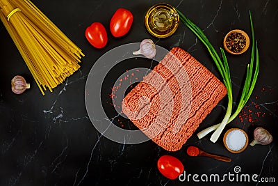 Ground beef, spaghetti pasta, garlic, tomato and onion Stock Photo