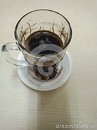 ground black coffee in a glass on the table Stock Photo