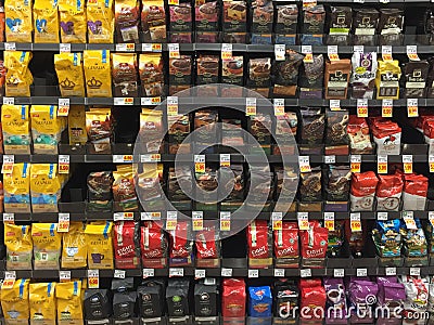 Ground coffee on shelves selling Editorial Stock Photo