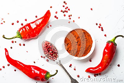 Ground pepper, peppercorn and fresh chili pepper on white Stock Photo