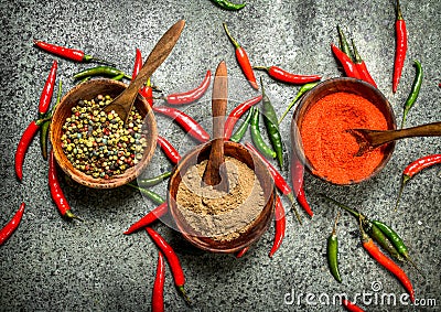 Ground red hot chili peppers in a bowl. Stock Photo