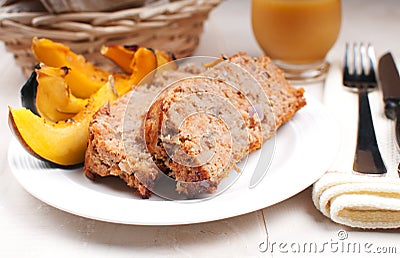 Ground turkey meatloaf and roasted squash Stock Photo
