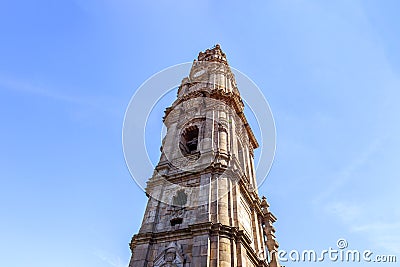 A ground view of ClÃ©rigos Tower on a sunny day. Porto, Portugal Editorial Stock Photo