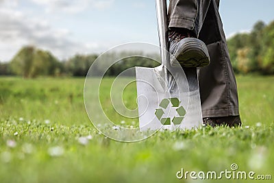 Groundbreaking ceremony with a sustainability symbol on the spade Stock Photo