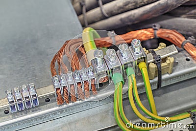 Grounding terminals and wires in electrical control cubicle Stock Photo
