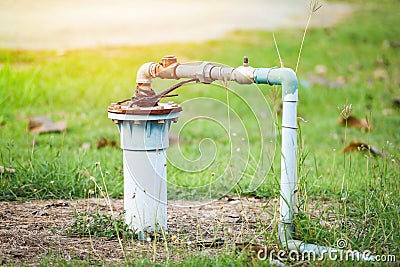 Groundwater well with pvc pipe and system electric deep well submersible pump water Stock Photo