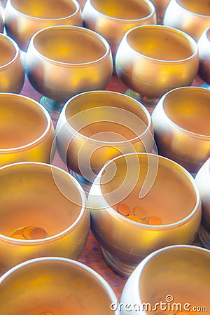 Group of alms bowls for donation Stock Photo