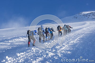 A group of alpinists on their way to the Elbrus Stock Photo