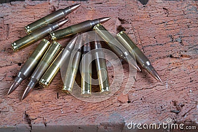 Group of ammunition on a bricks Stock Photo