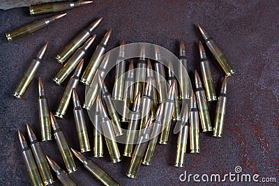 Group of ammunition on a rusted metal background Stock Photo